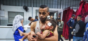 Israel says Gaza ceasefire back on after more than 100 reported killed in strikes