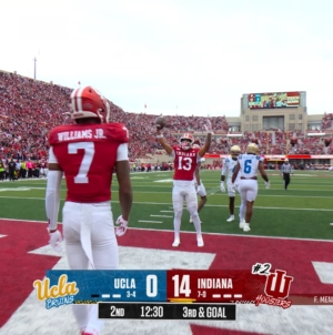 Fernando Mendoza finds Elijah Sarratt for a TD to put Indiana up 21-0 over UCLA