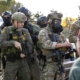 ICE Agent Pointed Gun at US Citizen, Said, ‘You’re Dead, Liberal’—Filing