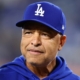 Dodgers’ Dave Roberts Takes Hilarious Fall While Racing Infielder
