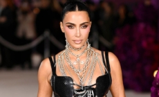 Kim Kardashian ditches face mask, shows off racy sheer dress in London