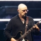 Oasis guitarist Paul Arthurs steps away from reunion tour for cancer care