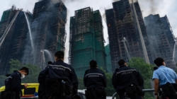 Fire in Hong Kong high-rise complex kills at least 94 people, hundreds reported missing; 3 arrested