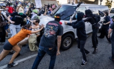 Photos: Anti-ICE protests gets heated on ‘National Shutdown’ day