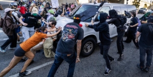 Photos: Anti-ICE protests gets heated on ‘National Shutdown’ day