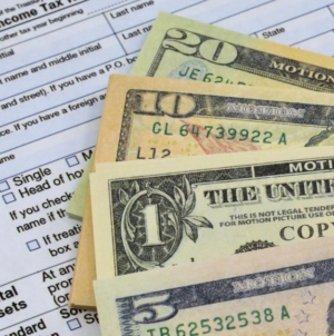 Here’s how Americans say they plan to use their bigger tax refunds this year