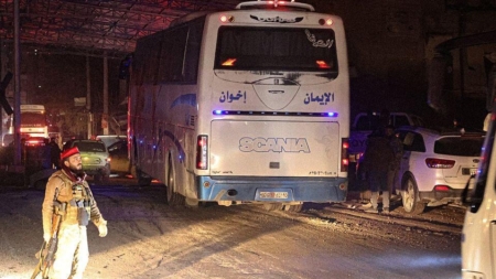 Kurdish fighters evacuate Aleppo after several days of violent clashes with Syrian government forces