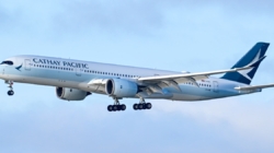 Passenger arrested after trying to open plane door mid-flight from Boston to Hong Kong