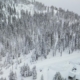 Rescuers search, amid worsening weather, for 10 skiers caught in Sierra avalanche