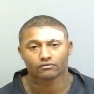 Former college football player arrested after 3-hour police standoff for allegedly beheading dog with machete