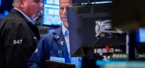 Dow slides nearly 800 points as AI and tariff risks rattle investors