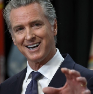 Newsom rejects ‘MAGA-manufactured outrage’ and racism allegations on book tour