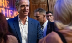 Commentary: Iran, Israel, pet otters and hair gel. Gavin Newsom’s book tour stops in L.A.