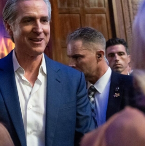 Commentary: Iran, Israel, pet otters and hair gel. Gavin Newsom’s book tour stops in L.A.