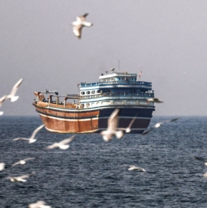 Shipping slows to a crawl through Strait of Hormuz, threatening to snarl international trade