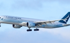 Passenger arrested after trying to open plane door mid-flight from Boston to Hong Kong