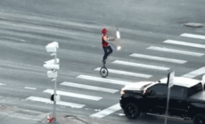 Fire-juggling unicyclist stops Colorado traffic at busy intersection
