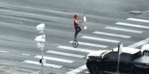 Fire-juggling unicyclist stops Colorado traffic at busy intersection