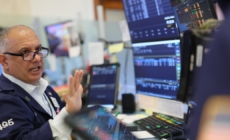 Stocks resume slide, as Dow drops nearly 700 points in early trading