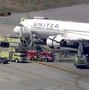 United flight makes emergency landing at LAX after engine fire reports